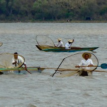Fishermen using traditional nets